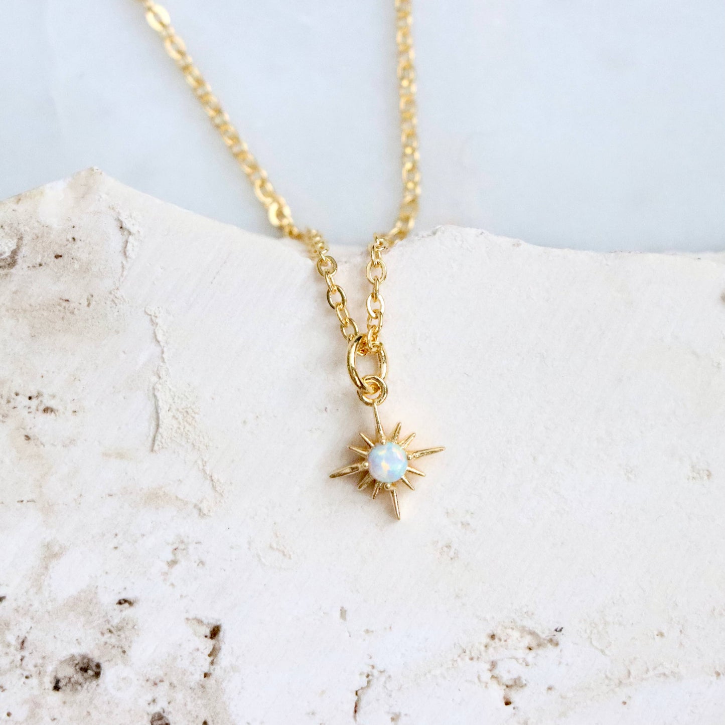 Mesa Blue Opal North Star Necklace featuring a sparkling opal pendant on a delicate chain.