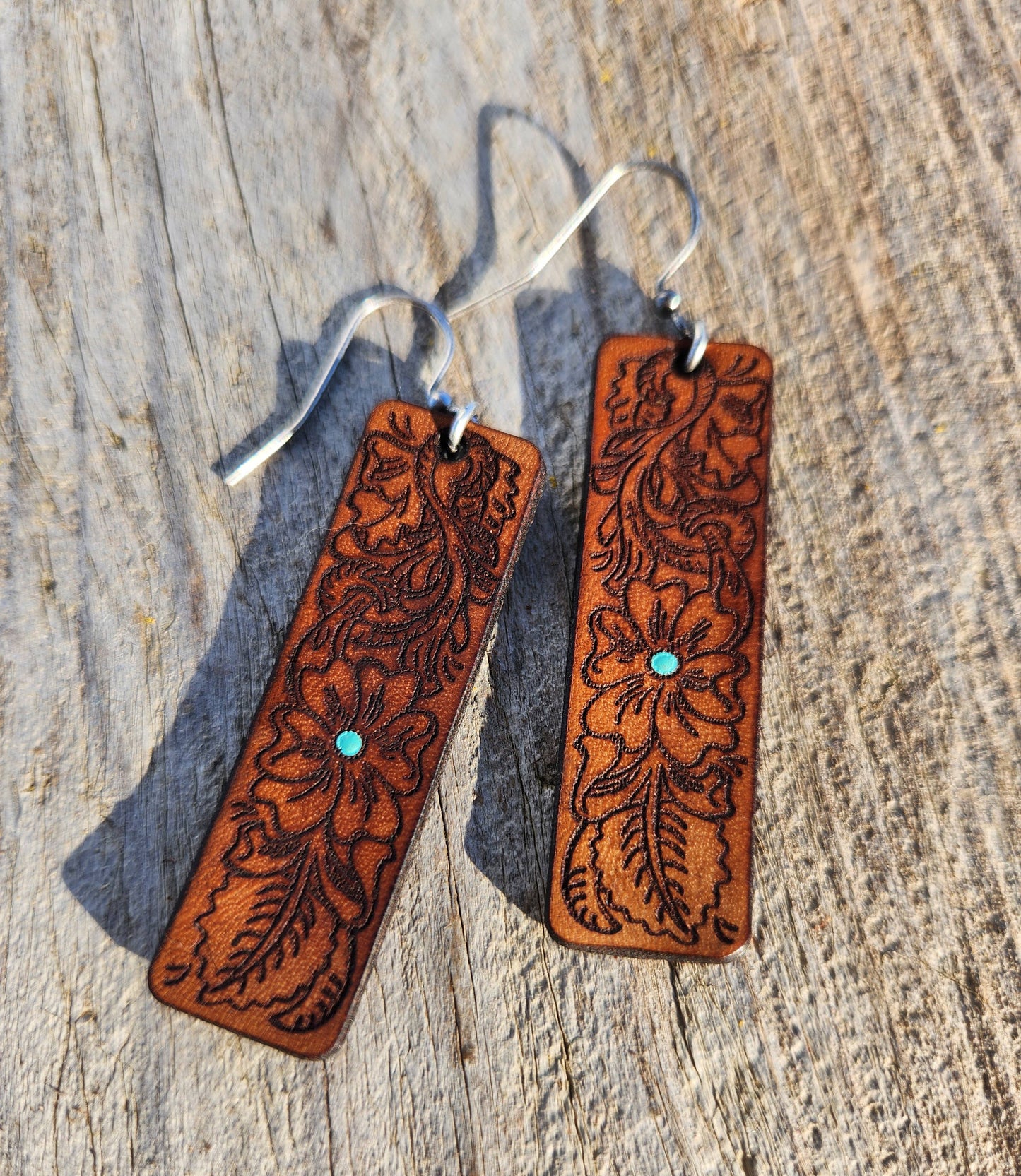 Annie Western earrings by Cocklebur Clothing Co., featuring vintage-inspired metal hoops with western-style detailing.