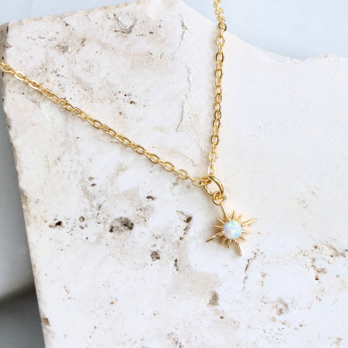 Mesa Blue Opal North Star Necklace featuring a shimmering opal pendant on a delicate chain.