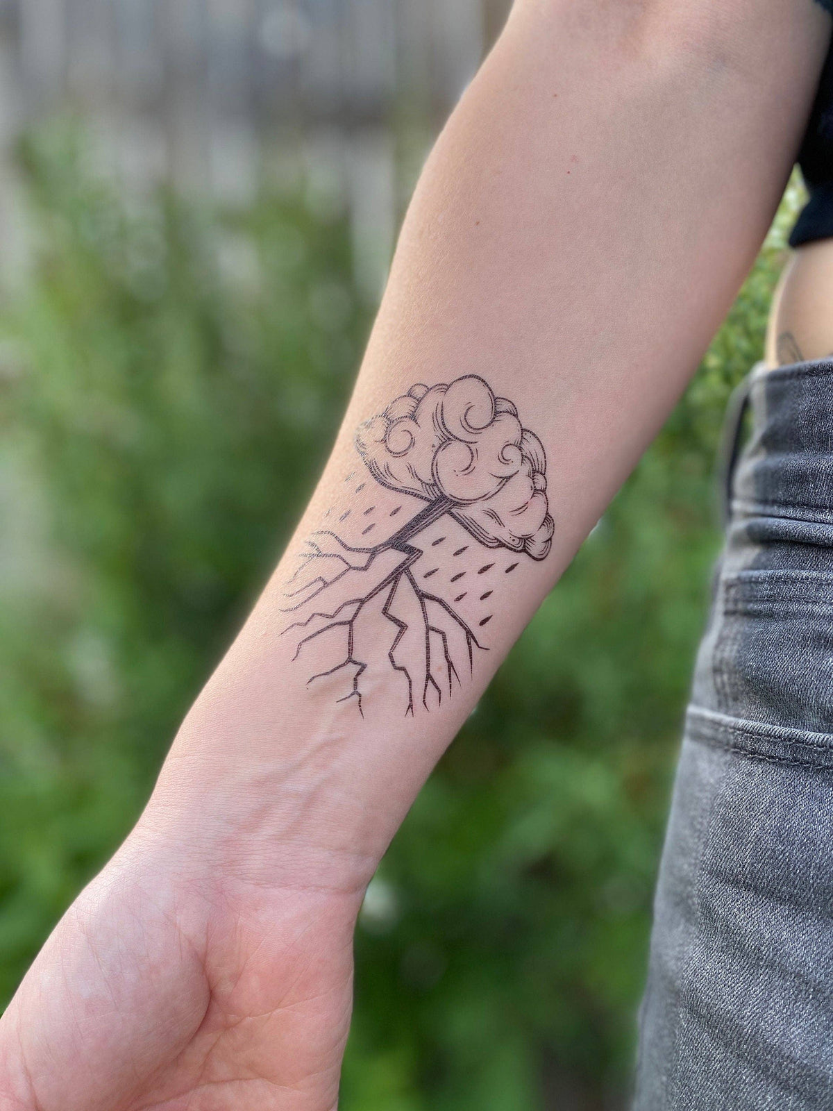 NatureTats Storm Cloud temporary tattoo featuring a realistic, detailed storm cloud design on skin.