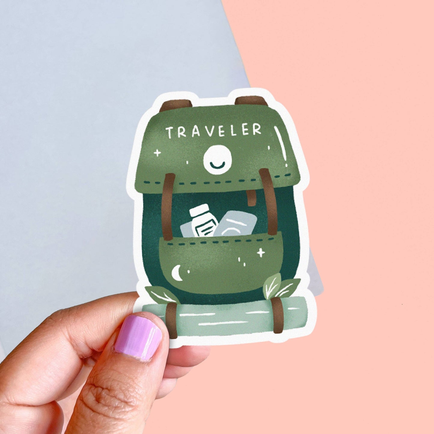 Colorful Traveler's Backpack Sticker by Occasionalish featuring travel-themed designs on a glossy sticker surface.