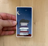Cat Sleeping on Books Sticker