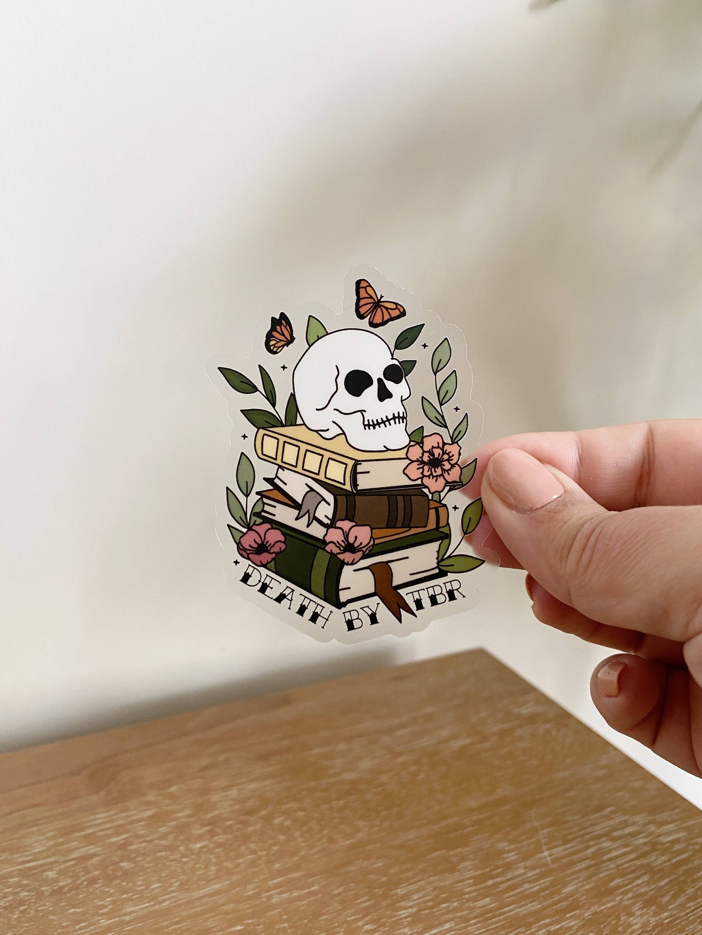 Death By TBR Skull Book Stack CLEAR Sticker - Storm and Sky Shoppe