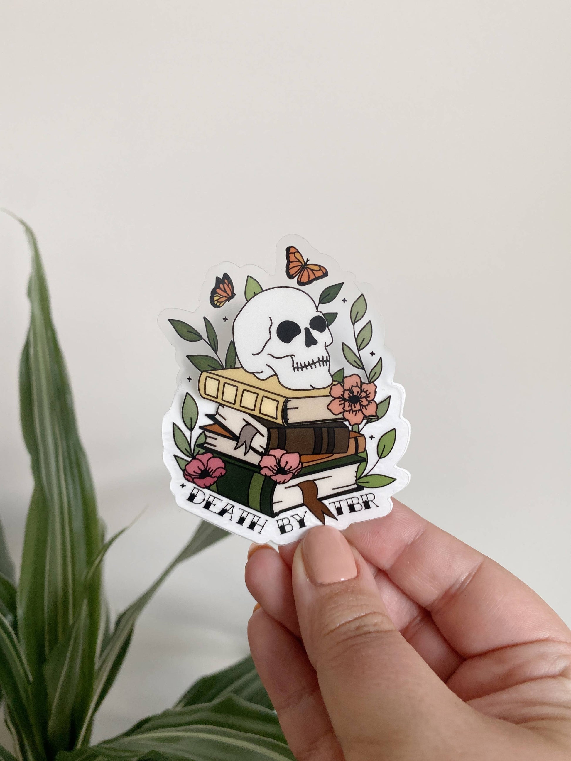 Death By TBR Skull Book Stack CLEAR Sticker - Storm and Sky Shoppe